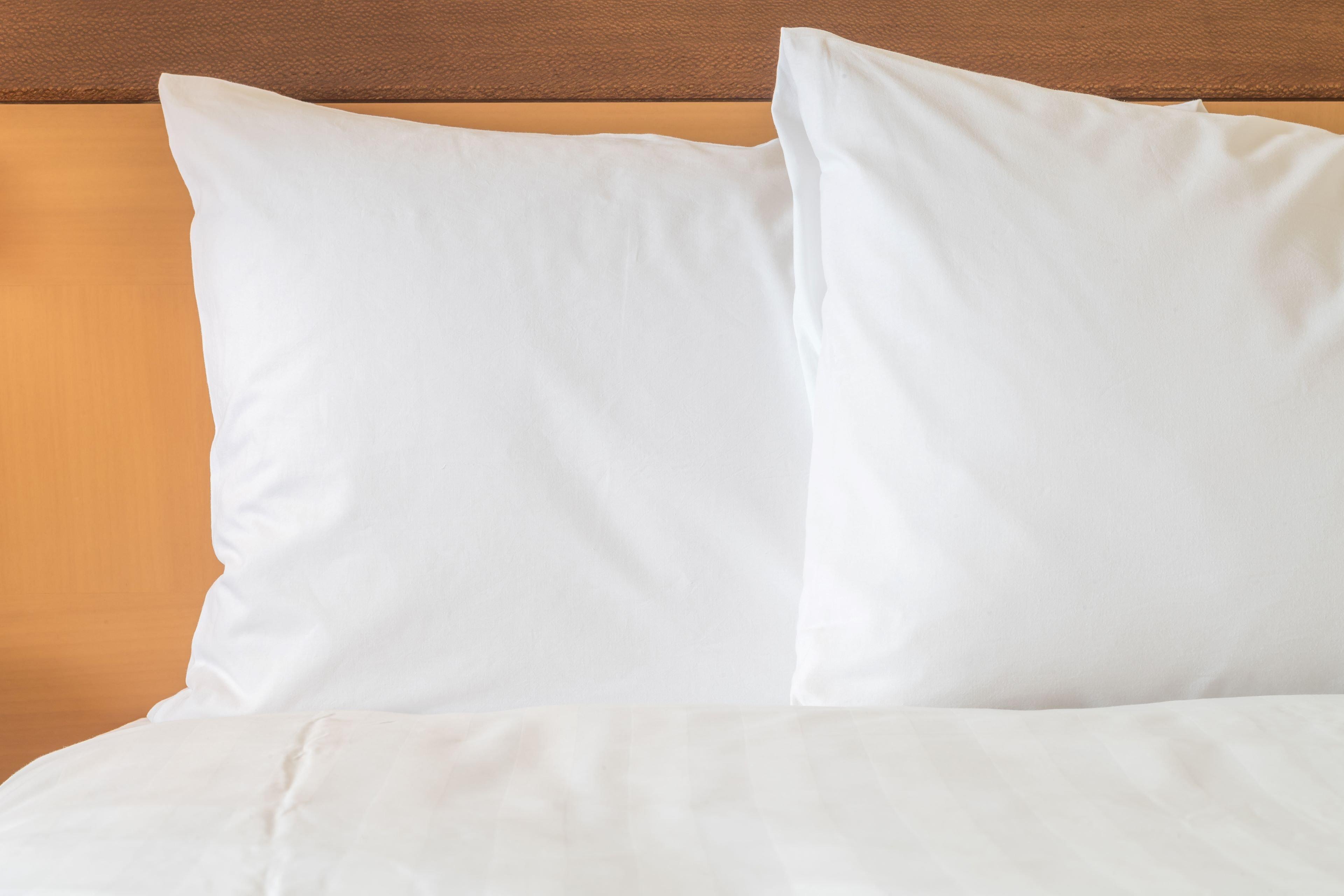 Intercontinental Bahrain, An Ihg Hotel Manama Exterior photo Two pillows on a bed